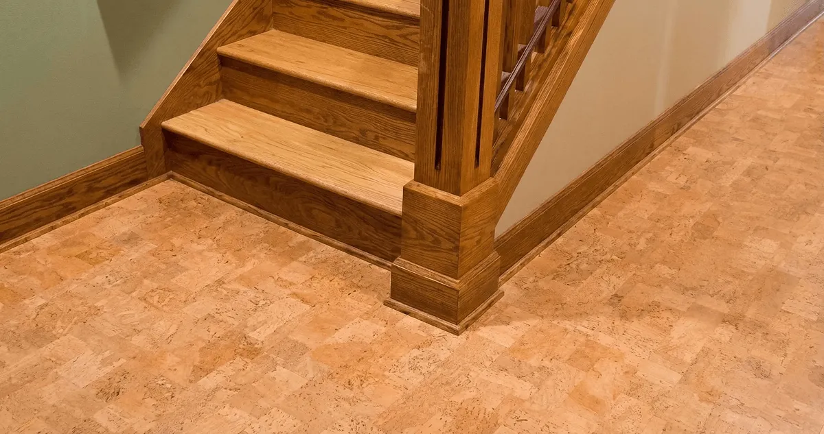 End of a staircase with cork flooring in Shreveport, LA