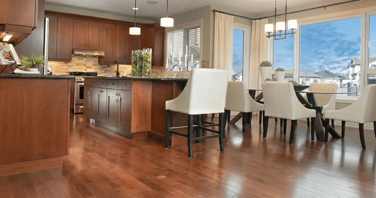 A modern kitchen with professionally installed wood flooring in Shreveport, LA